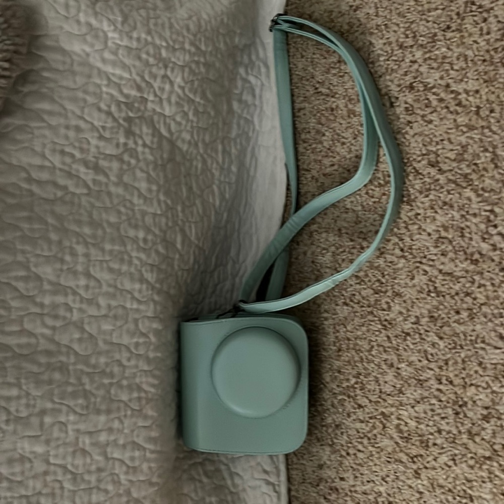 Teal Insta mini 9 camera pouch bag.